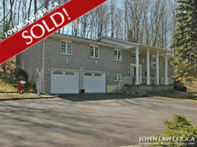 TREED COUNTRY SETTING ON 7 ACRES